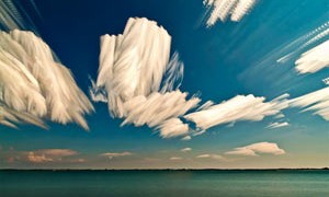 layered-skies-blurred-clouds-surreal-ocean-nature-small-300